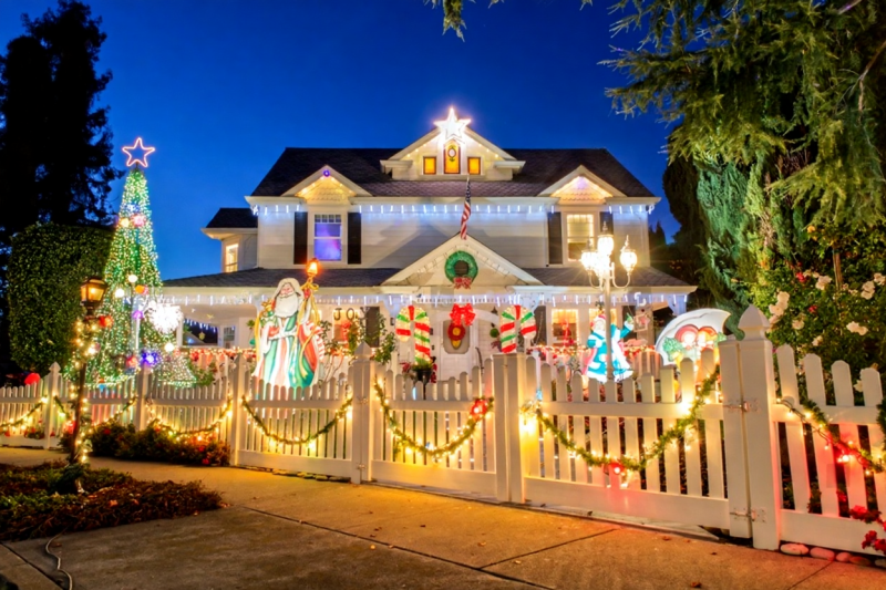 ice skating, Union Square, San Francisco, Christmas tree, holiday tradition, winter activities, people having fun}