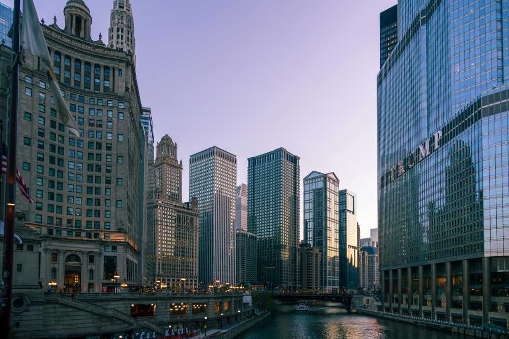 Chicago River, St. Patrick's Day, green river, Chicago skyline, dyeing spectacle, urban celebration, aerial view}