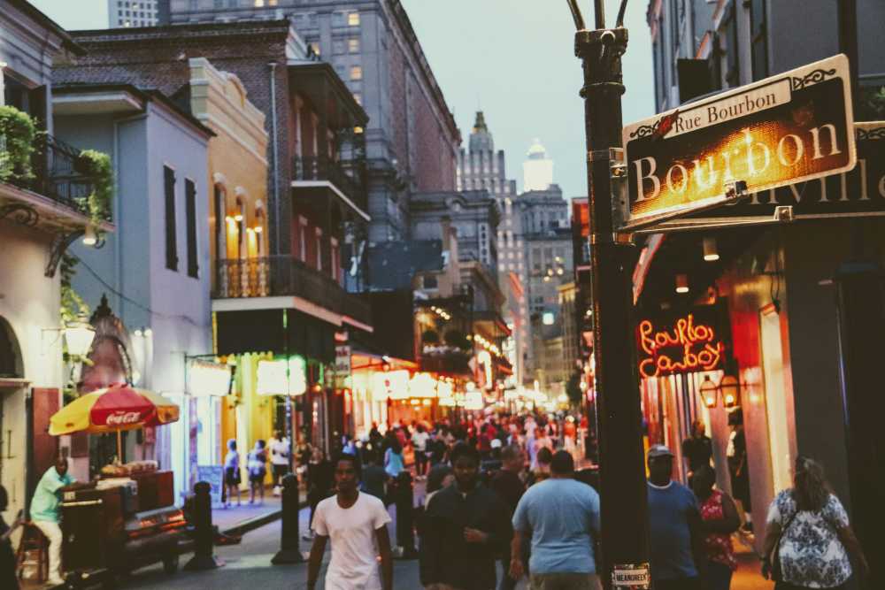 New Orleans, French Quarter, balcony, gas lamp, historic architecture, vibrant street scene, travel destination