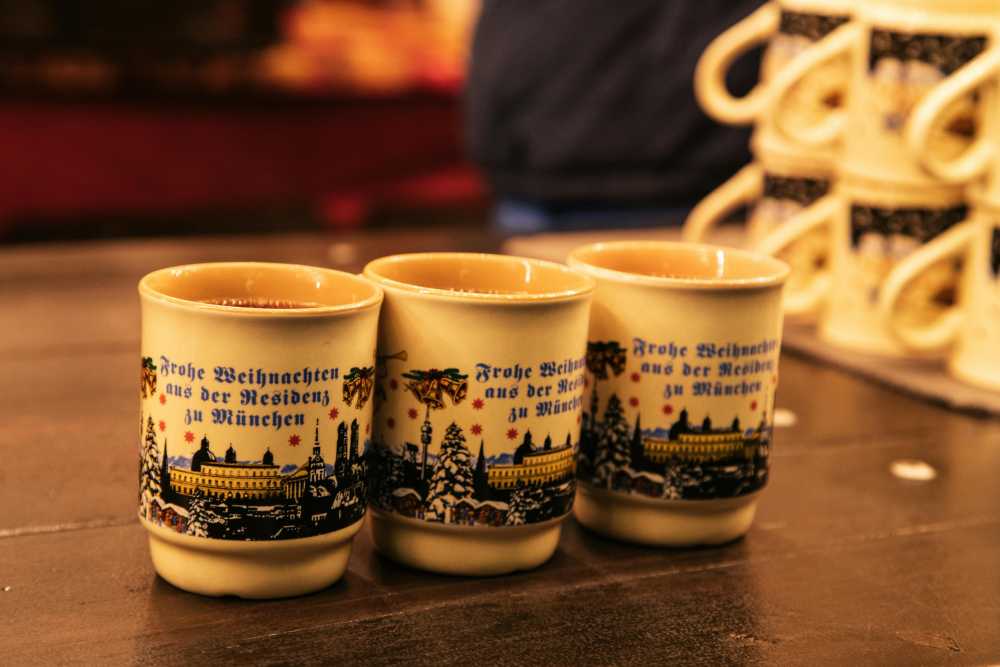 Chicago Christmas market, Daley Plaza, festive lights, dusk, holiday shoppers, city skyline, Christkindlmarket}