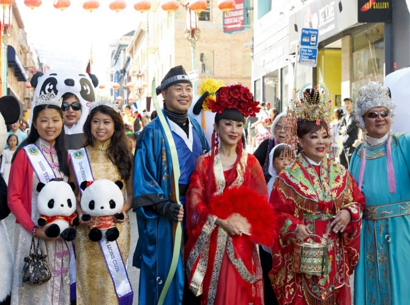 SF Pride Parade, rainbow flags, Market Street, LGBTQ celebration, diverse crowd, city parade