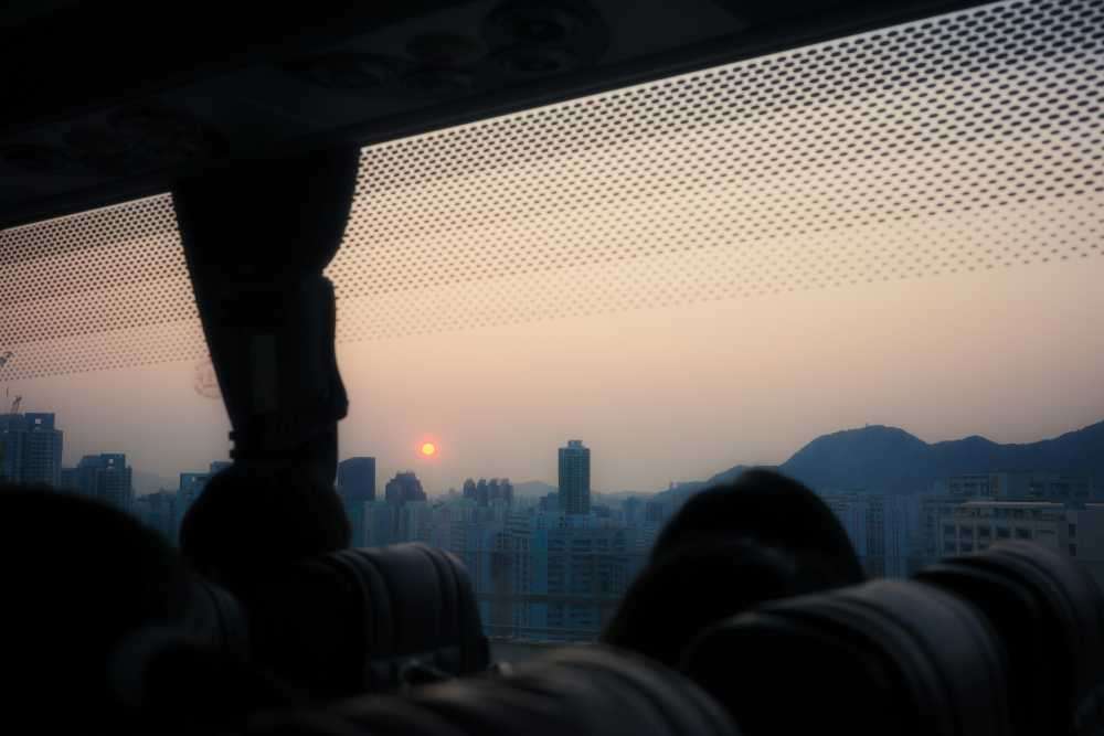 woman reading book, cafe, solo, parisian street, content, relaxed, enjoying solitude