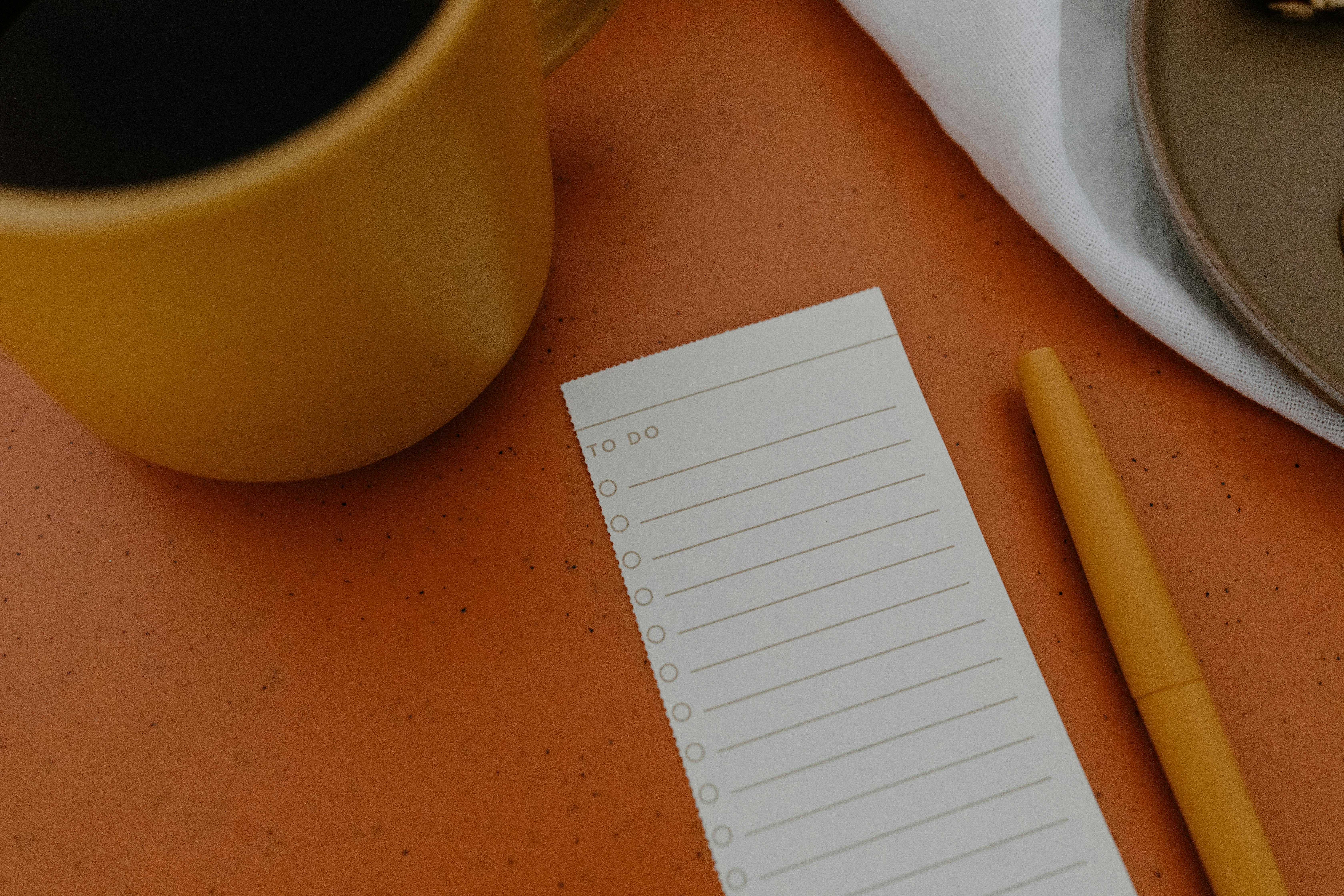 flat lay, travel gear, backpack, camera, passport, hiking boots, notebook, organized, adventure prep