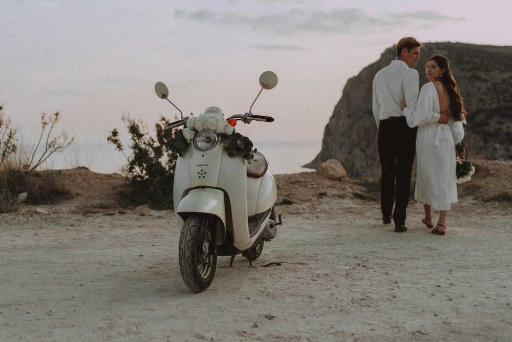 family planning trip, looking at map, kids pointing on map, travel itinerary, kitchen table, excited family