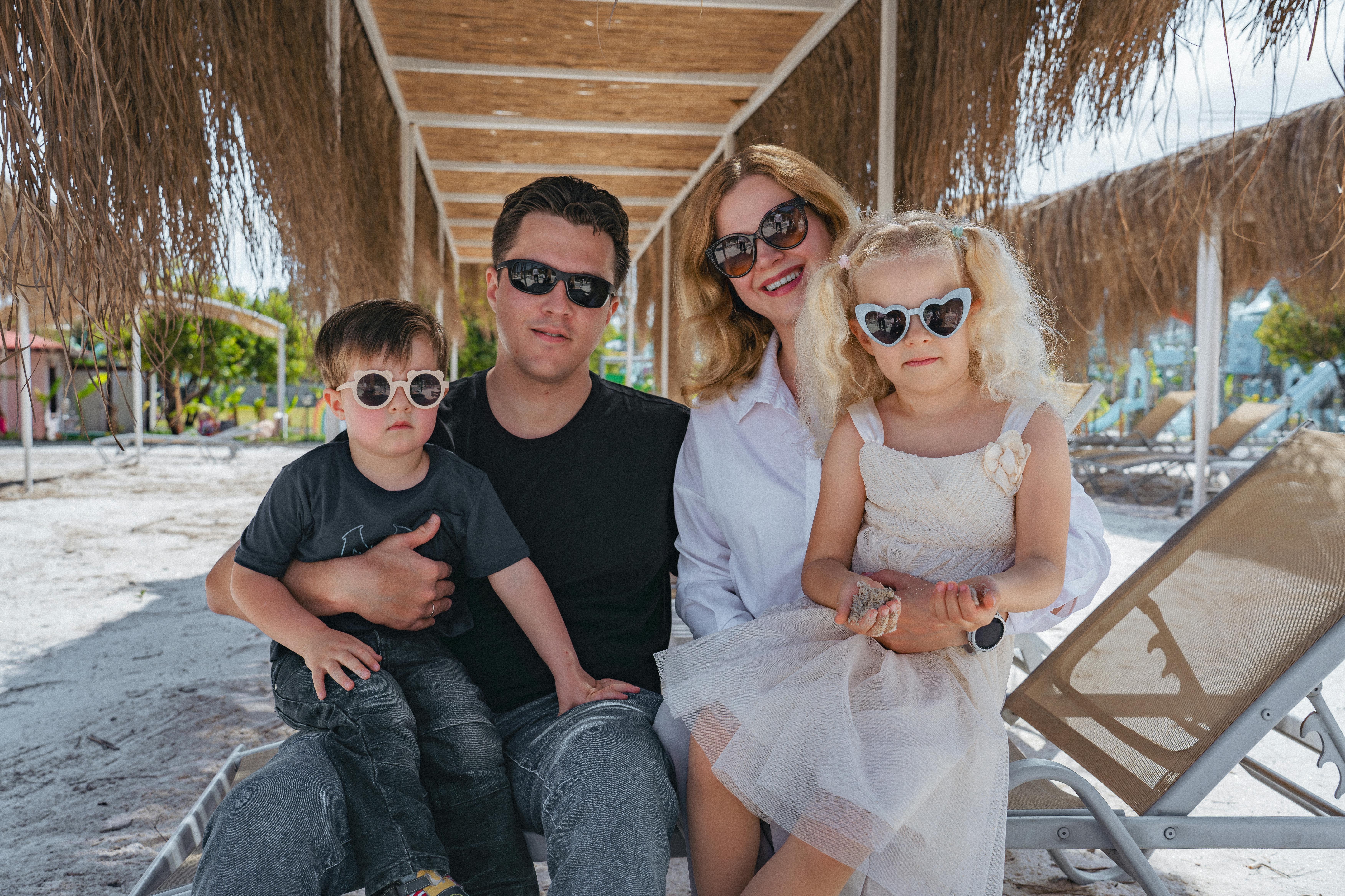 family hiking, bluff overlooking Pacific Ocean, Big Sur, rugged coastline, Northern California, dramatic cliffs, coastal fog