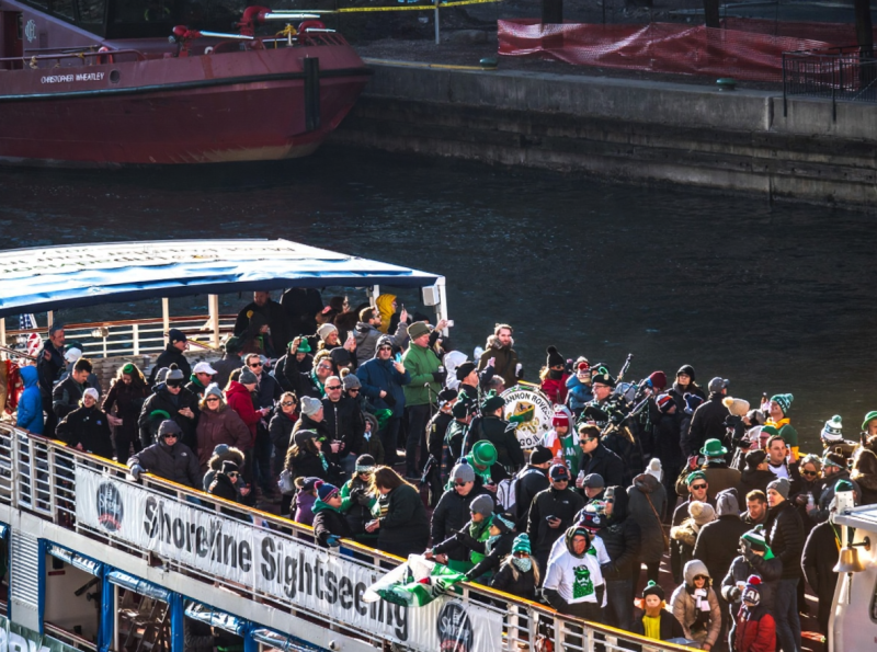 Chicago River dyed green, St. Patrick's Day Chicago, city architecture, green water, celebration, aerial view}