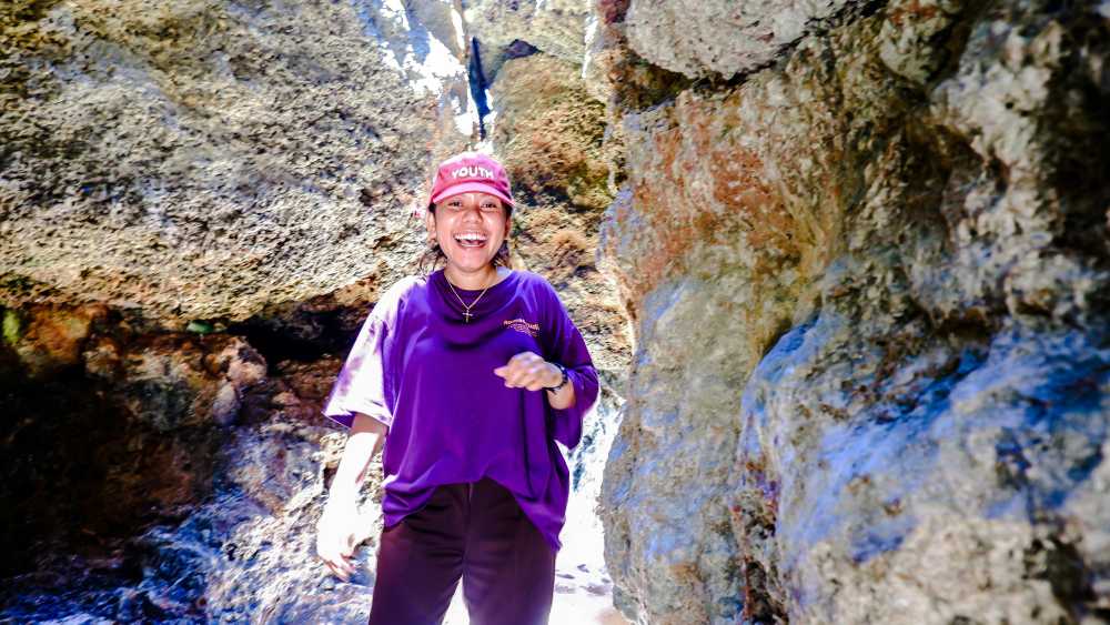 solo female traveler, backpack, looking forward, city street, confident, empowered, urban exploration}