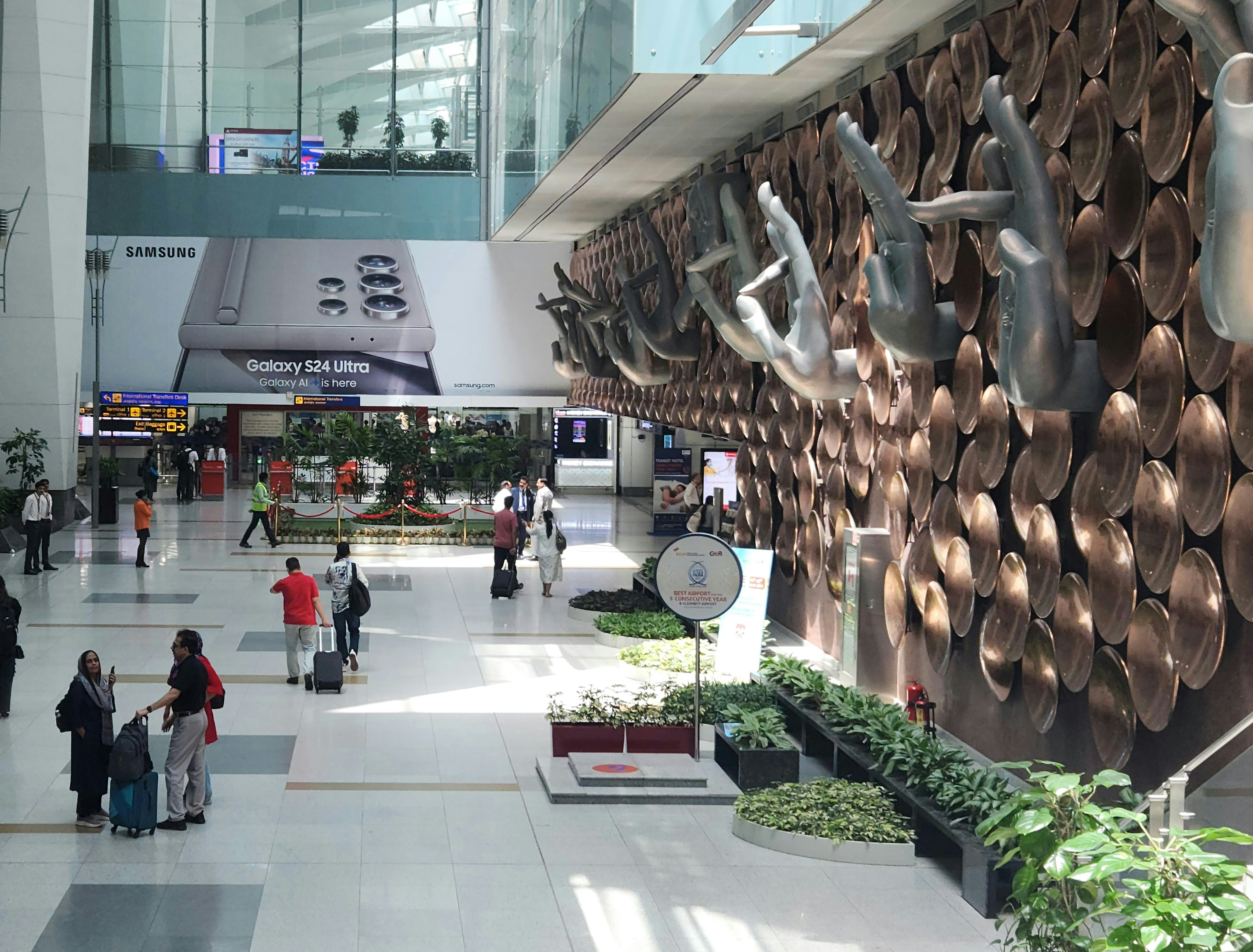 travel tech flat lay, smartphone, wise card, passport, portable charger, minimalist, backpack essentials