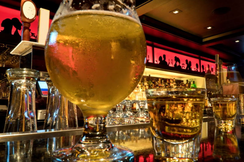 Navy Pier fireworks, July 4th Chicago, Lake Michigan, city skyline at night, rooftop bar view, patriotic celebration}