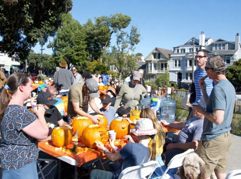 Golden Gate Park at night, foggy atmosphere, illuminated trees, spooky path, San Francisco nature, quiet Halloween, ambient light}